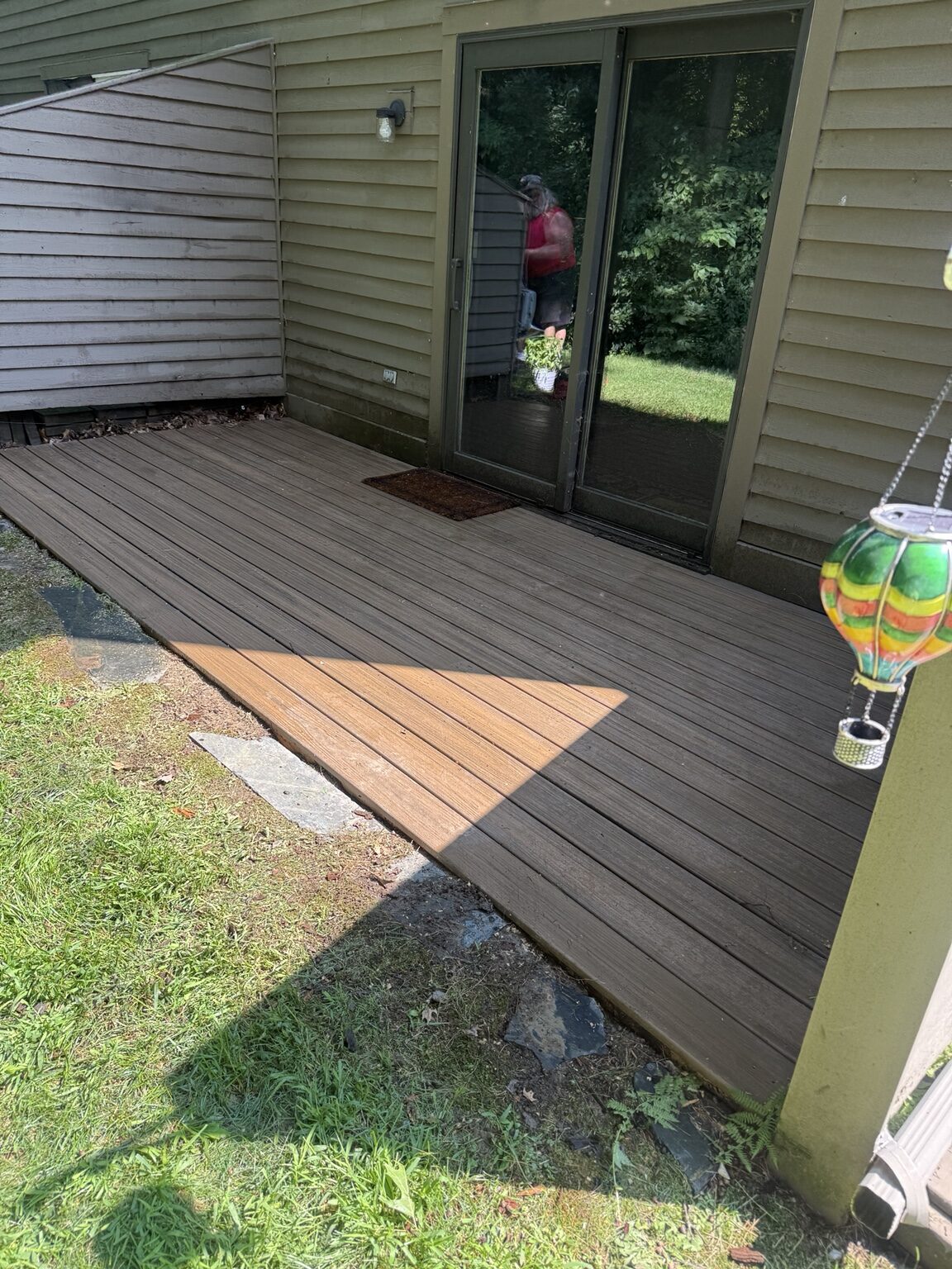 Low deck landing outside sliding doors
